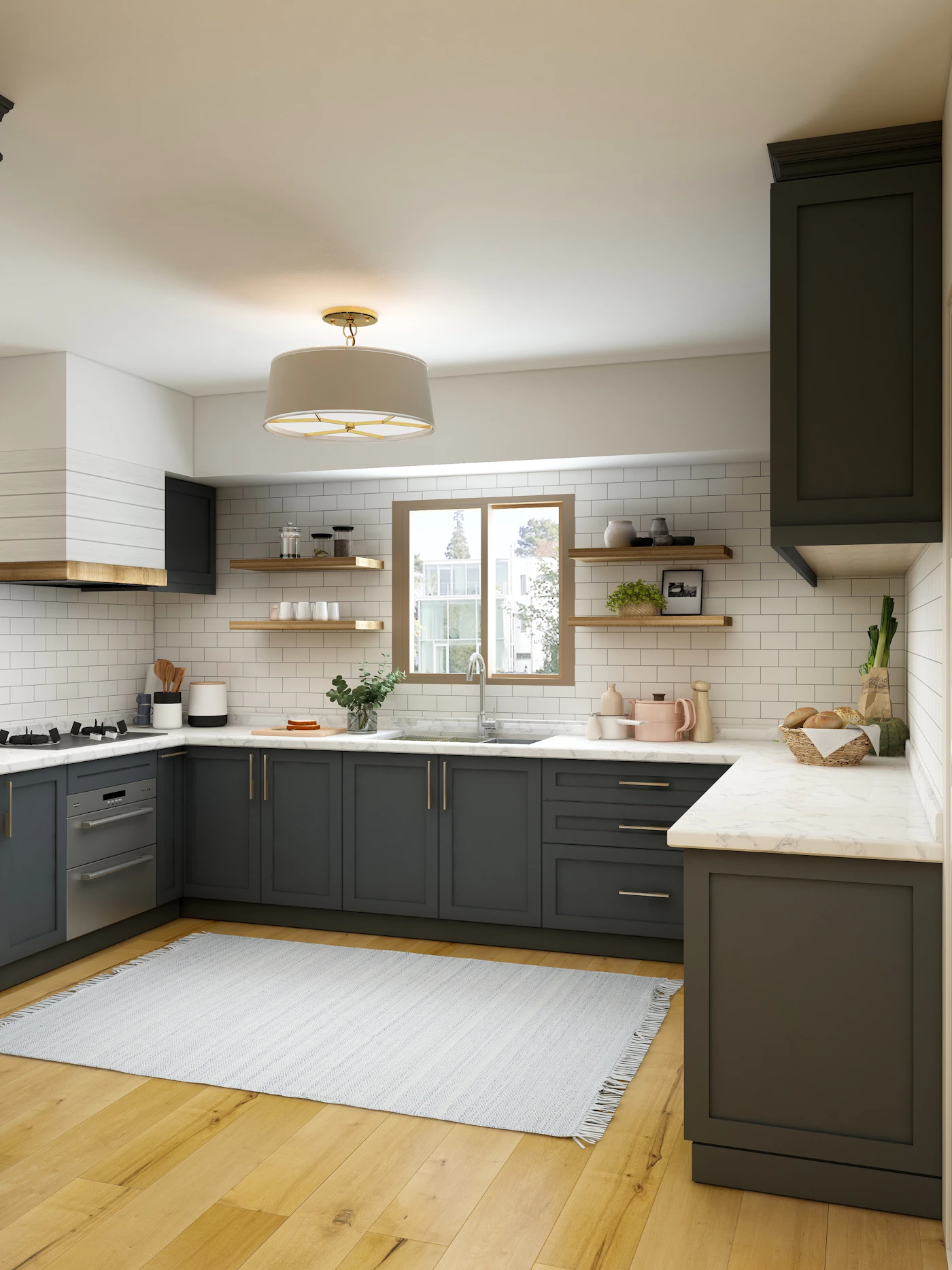 Modular kitchen with navy cabinetry, brass pendant lighting and marble backsplash