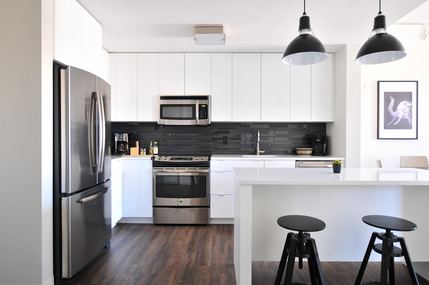 Kitchen and living interior suited to a 3 BHK home